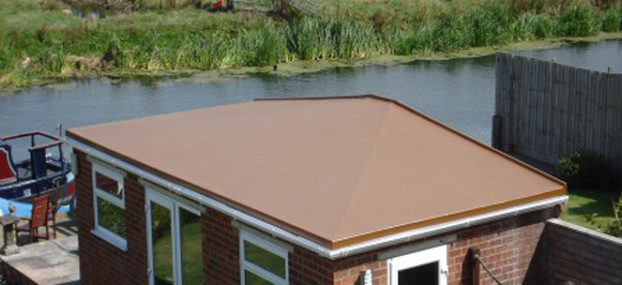 At Premier Fibreglass Flat Roofing, we offer a top quality GRP Fibreglass flat roofing system that is seamless and durable and comes with a full 25 year written guarantee for your total peace of mind. You also have the choice of endless top coats to choose from and insulation can be easily incorporated. We have installed countless new roofs for many satisfied customers so call us today for more details.